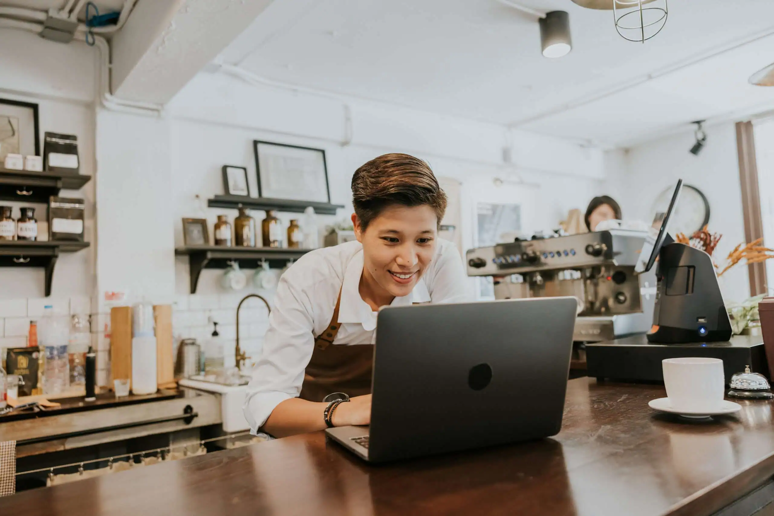 A coffee shop owner doing his own digital marketing